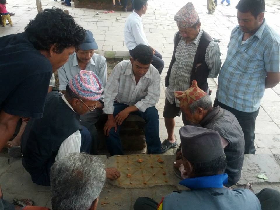 Elderly players enjoing Baghchal at Basantapur Durbar Square